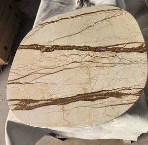 طاولة طعام من الرخام الأبيض الإيطالي بقاعدة معدنية، تصميم دائري عصري لغرفة المعيشة والعائلة والمقاهي، مع ضمان لمدة عام - Product Image 1