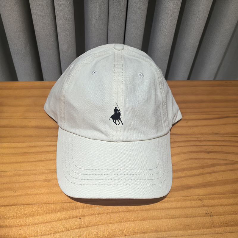 Etichetta bianco latte-blu scuro