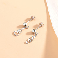 E185 Boucles d'oreilles pendantes pour guitare asymétrique punk mignonne avec note musicale en zircon pour filles bijoux de mode pour femmes