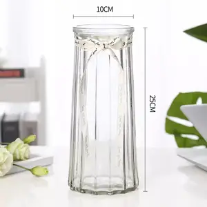 छोटा सस्ता रंगीन ग्लास फूलदान नोडिक विंटेज खाली साफ़ ग्लास बोतल जार 2024 नई डिजाइन उच्च गुणवत्ता