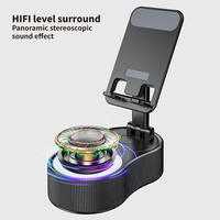 Altavoz Inalámbrico Portátil Giratorio 360 Grados con Soporte para Teléfono, Mini Batería Externa Flexible y Altavoz RGB