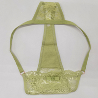 Tanga de encaje antibacteriano de talle bajo sin costuras para mujer con patrón floral bordado de nailon y elastano