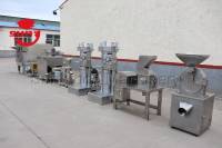 Fabricant d'usine Machines commerciales d'extraction d'huile de cacao Broyeur de fèves de cacao Ligne de production pour le traitement de la poudre de cacao