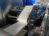 Équipement de fabrication de lingettes pour bébés : Machine de production de lingettes humides magiques et de serviettes froides