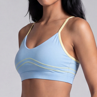 Soutien-gorge de sport rembourré pour femme, col en V, bretelles fines réglables, couleur contrastante, sensation seconde peau, séchage rapide, personnalisable avec logo OEM, vente en gros