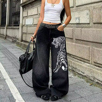 Pantalon en jean noir à imprimé tigre blanc style American High Street, délavé et vieilli, coupe ample, jambe large, droit, longueur au sol