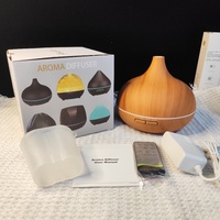 Diffuseur d'huiles essentielles à grain de bois 2026, vente en gros, diffuseur de parfum 500 ml, machine diffuseur de parfum, humidificateur de bureau, diffuseur ultrasonique domestique