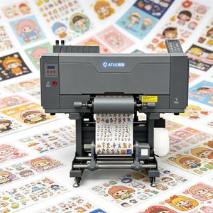 Stampante Inkjet UV DTF Roll-to-Roll A3 ATUE con inchiostro UV per stampa a trasferimento con effetto 3D su adesivi dorati e biglietti - Novità - Product Image 1