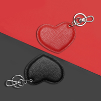 Breloque de téléphone en cuir grainé de luxe en forme de cœur, porte-clés, pendentif de sac avec fermoir en métal argenté pour cadeau de Saint-Valentin et souvenir de mariage
