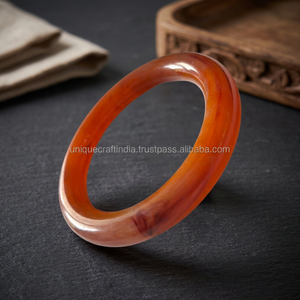 Bracelet en résine époxy fait main, orange, bijou d'art, objet de collection, technique de moulage artisanal |   Décoration de fête artisanale unique d'Inde - Product Image 1