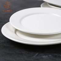 Assiettes en céramique rondes et plates en porcelaine blanche mate anti-puce pour restaurants à bas prix de haute qualité vente en gros