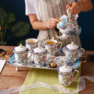 Service à thé complet en porcelaine fine écologique de style chinois moderne et luxueux, avec théière à eau froide, tasses à thé, couvercles et coffret cadeau - Product Image 1