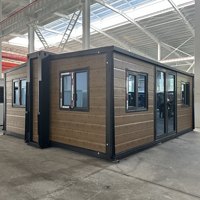 700 Mini maison de bureau de conteneur d'expédition en acier extensible modifié pour application de supermarché en plein air avec panneau sandwich