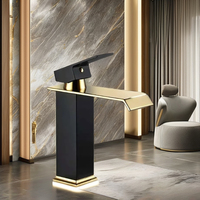Robinet de lavabo cascade moderne en acier inoxydable or et noir avec capteur sans contact et fonctions d'eau chaude et froide temporisées