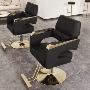 Sillón de Barbería Hidráulico Negro y Dorado con Altura Ajustable y Rotación de 360 Grados para Barbería y Salón de Belleza - Product Image 1