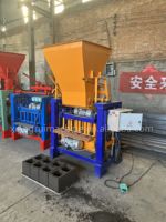 Utilisé pour fabriquer la machine de fabrication de briques creuses à emboîtement de bâtiment machine automatique de formage de blocs de ciment