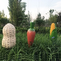 Sculptures réalistes de fruits et légumes en fibre de verre Statue de cacahuètes et de maïs en résine personnalisée en grande taille pour le jardin