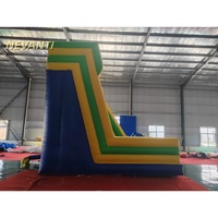 Mur d'escalade gonflable commercial à double toboggan en PVC pour événements extérieurs