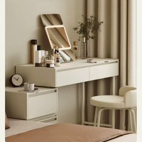 Ensemble de coiffeuse étroite tout métal avec miroir LED pliable en trois parties, organisateur de cosmétiques multi-niveaux et armoire latérale à 2 tiroirs, finition douce