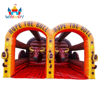 Vente en gros directe usine : Jeu gonflable 'the Bull' à double piste avec cordes - Manège interactif de divertissement extérieur pour fêtes foraines
