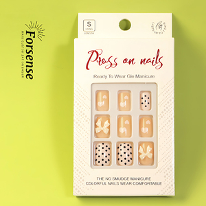 24 pcs vente en gros de <span class=keywords><strong>faux</strong></span> ongles roses coeurs blancs avec breloques arcs 3d ongles artificiels de luxe points noirs nouveau design - Product Image 6