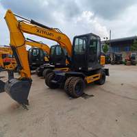 Excavatrice sur pneus d'occasion 7 tonnes XINYUAN 75, faible nombre d'heures, bon état, en stock à vendre