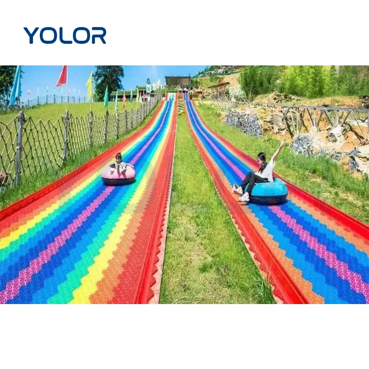 Custom amusement park playground large plastic dry snow slide rainbow slide in ground slide slope hill