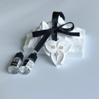 Diffuseur de parfum d'ambiance suspendu en céramique d'aromathérapie avec pierre de plâtre et logo personnalisé OEM désodorisant pour voiture