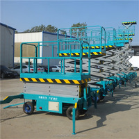 Plateforme élévatrice à ciseaux hydraulique mobile électrique sûre et stable avec une capacité de 100 kg, plateforme antidérapante durable pour usine, atelier, sous-sol