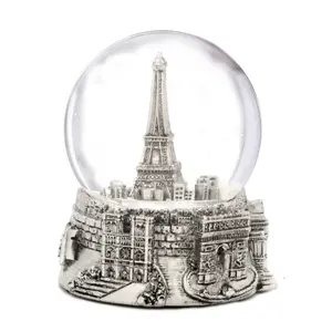 Attractions touristiques personnalisées en usine Souvenirs boule de cristal en résine New York Dubai mini globe d'eau artisanal en résine de verre globe à neige