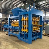 Machine à fabriquer des briques en ciment contrôlée par PLC QT8-15 avec vibration hydraulique pour une production stable de blocs de béton