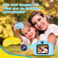 Cámara para niños en stock en EE. UU., mini HD con pantalla de 2.4 pulgadas, 1080P, impermeable, gran angular, con tarjeta MicroSD, para video y fotos, juguete y regalo para niños