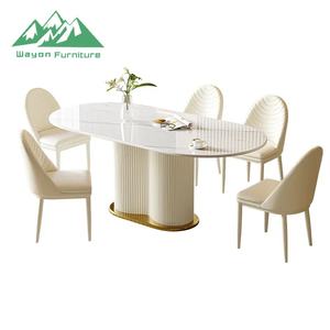 <span class=keywords><strong>Table</strong></span> à manger en pierre frittée de style crème moderne Wayon, ensemble de <span class=keywords><strong>table</strong></span> et de chaises ovales créatif et peu encombrant pour petit appartement - Product Image 1