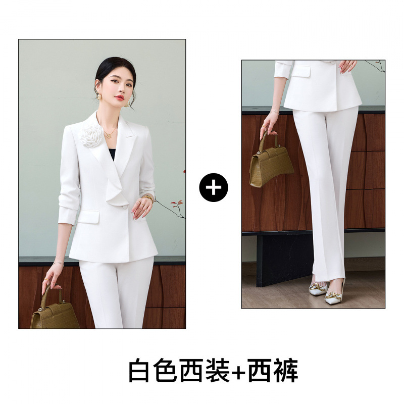 White suit with slightly flared trousers