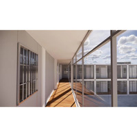 Gran Edificio Modular Prefabricado de 2 Pisos para Dormitorios de Trabajadores con Pasillo Interior y Escalera de Vidrio para Campamentos en Obras de Construcción