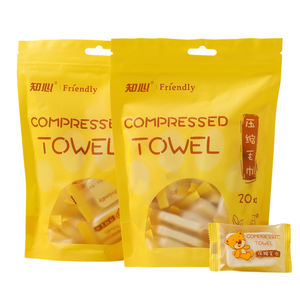 Draagbare magische mini gecomprimeerde effenkleurige bad- en gezichtshanddoeken van niet-geweven katoen voor thuis & op reis, snoepverpakking, wegwerpbaar - Product Image 1