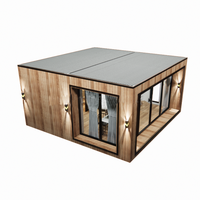 Maison conteneur préfabriquée mobile portable avec roues et remorque à barres d'acier pour usage extérieur