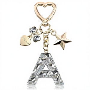 Llavero con Letra Inicial en Inglé<span class=keywords><strong>s</strong></span>, Diseño de Estrella, Corazón y Lazo, Colgante de Cobre Brillante, Accesorio para Bolsos, para TI - Product Image 1