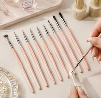 Ensemble de 9 pinceaux à ongles en bois rose mat avec poils en nylon importés pour la peinture d'ongles professionnelle en salon
