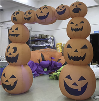 Arche gonflable de citrouille d'Halloween avec des yeux rouges et des crocs aigus pour la décoration de maison hantée en plein air et de fête d'enfants