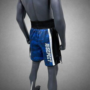 Shorts de boxe professionnels en tissu satiné lisse, coupe confortable, conçus pour l'entraînement, la compétition et la performance physique. - Product Image 3