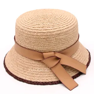 D D 2024 도매 우아한 Cloche 모자 천연 라피아 밀짚 브레이드 버킷 모자 여성용 가죽