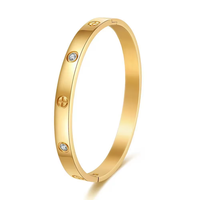 Bracelet jonc en acier inoxydable plaqué or 18 carats et argent, motif croix et cœur, anti-ternissement, par un fabricant de bijoux de mode