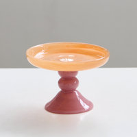 Bol sur piétement en verre soufflé à la main avec dessus abricot pêche et base rose framboise, support de présentation décoratif artistique moderne