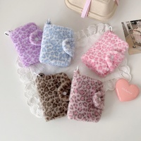 Porte-monnaie élégant à imprimé léopard rose, organiseur de cartes bancaires portable pour étudiants, porte-cartes polyvalent en peluche, étui pour écouteurs, tendance