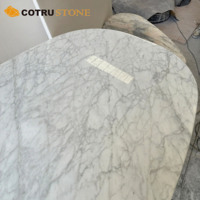 Table de salle à manger italienne en marbre blanc de Carrare Table longue ovale en pierre naturelle pour le salon Meubles décoratifs