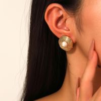 Haute Qualité Designer Unisexe Boucles D'oreilles À La Mode Nid D'oiseau Perle Goujons Plaqué Or Géométrique En Laiton Bijoux pour Cadeau De Mariage