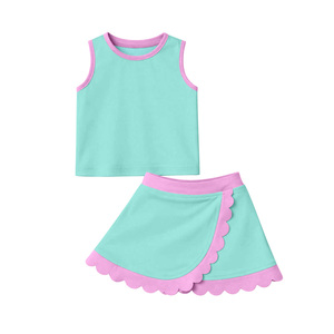 Précommande MOQ 5 – Ensemble de yoga uni pour filles avec débardeur et jupe festonnée – Vêtements de sport confortables pour le tennis – Prix usine – Vente en gros - Product Image 3