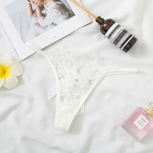 Vente directe d'usine de lingerie sexy en dentelle ajourée, tangas transparents très sexy, culottes taille basse à nœud papillon pour femmes. - Product Image 3