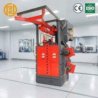Machine de sablage à crochet Puhua Q37 certifiée CE, utilisée pour le nettoyage de diverses pièces automobiles.